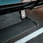 2022 RAM Crew Cab with AMP Research Power Steps and a Bakflip MX4 Tonneau Cover at Dealer Source Ltd in San Antonio, Texas