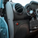 2010 Jeep Wrangler with hitch mounted feeder wired to button in vehicle. Installed by Dealer Source Ltd in San Antonio, Texas.