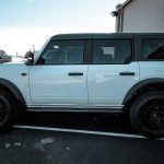 2022 Ford Bronco with Rough Country Oval Nerf Steps at Dealer Source Ltd in San Antonio, Texas.