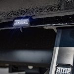 2023 Ford F-250 -Rough Country 3 inch Lift Kit -Wheels- Fuel D576 Assault Size: 20x10 -Tires-Nitto Ridge Grappler -Amp Steps -Black Katzkin Leather with Diamond Lunar Grey inserts, Lunar Grey Wings, & a Lunar Grey Seam