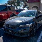 2024 Honda Civic -Black Katzkin leather with red wings, a red seam, & and perforation