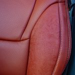 2022 Tundra -Katzkin Leather in the color Cognac. Perforated Combo with Outlaw Suede Wings and a Pearl Seam Reference 99407