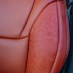 2022 Tundra -Katzkin Leather in the color Cognac. Perforated Combo with Outlaw Suede Wings and a Pearl Seam Reference 99407