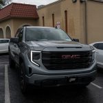 2024 Sierra Crew Cab Licorice Leather with Cobblestone Wings, a Platinum Seam, and Tek Perforation Reference 99570