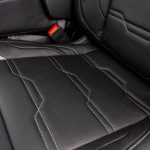 2024 Sierra Crew Cab Licorice Leather with Cobblestone Wings, a Platinum Seam, and Tek Perforation Reference 99570