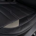 2024 Sierra Crew Cab Licorice Leather with Cobblestone Wings, a Platinum Seam, and Tek Perforation Reference 99570