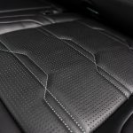 2024 Sierra Crew Cab Licorice Leather with Cobblestone Wings, a Platinum Seam, and Tek Perforation Reference 99570