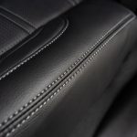 2024 Sierra Crew Cab Licorice Leather with Cobblestone Wings, a Platinum Seam, and Tek Perforation Reference 99570