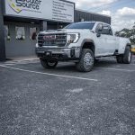 2024 Sierra Crew Cab 3500 Black leather, Mahogany Face, Stone Seam, Perforation Combo, Tek Stitch Reference 100582